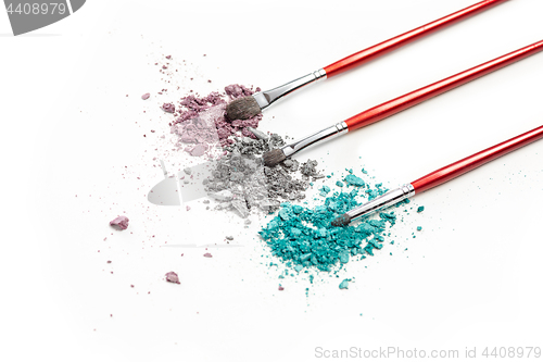 Image of The colored eyeshadow crushed on white close up for background