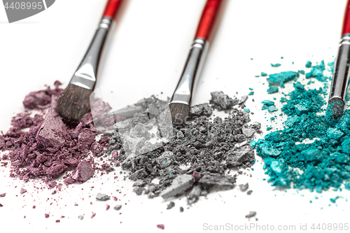 Image of The colored eyeshadow crushed on white close up for background