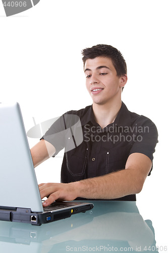 Image of Young Man Using a Laptop