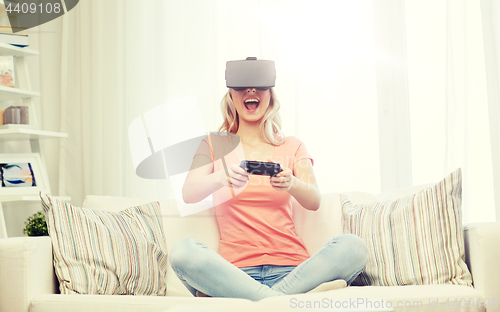 Image of woman in virtual reality headset with controller