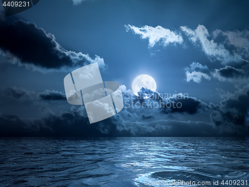 Image of Full moon over the ocean