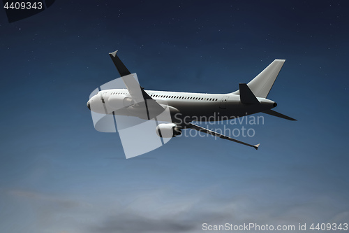 Image of an airplane in the night sky