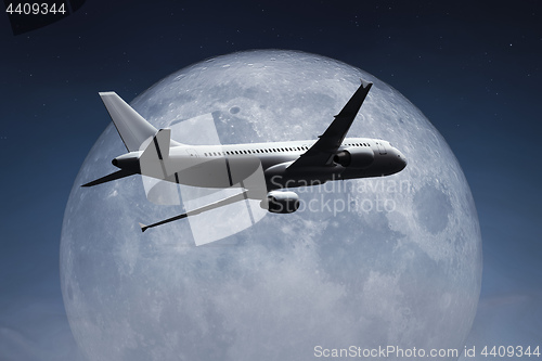 Image of an airplane and the moon