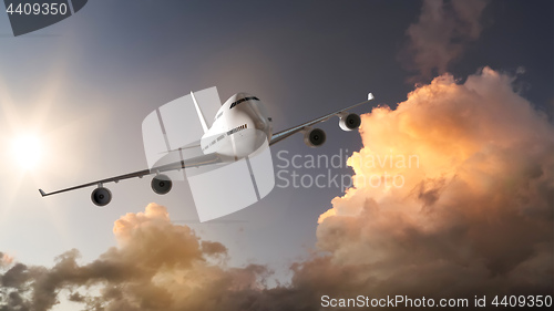 Image of an Airplane and the sunset sky