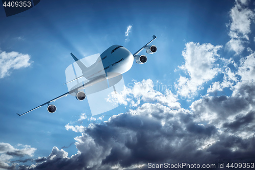 Image of An airplane and the dramatic sky