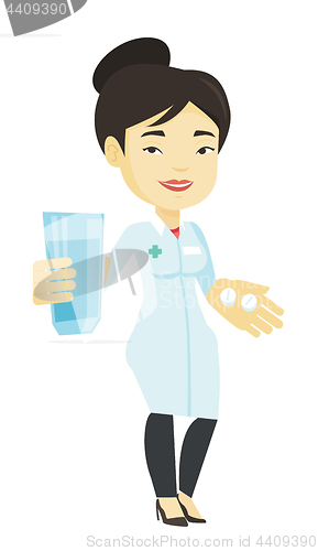 Image of Pharmacist giving pills and glass of water.