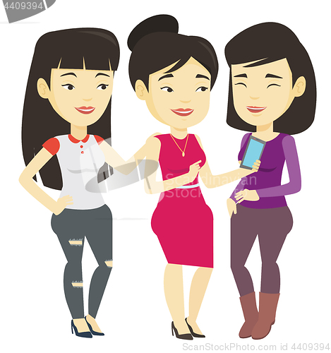 Image of Three smiling friends looking at mobile phone.