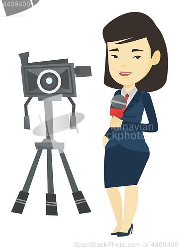 Image of TV reporter with microphone and camera.