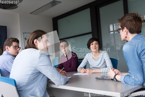 Image of Business Team At A Meeting at modern office building