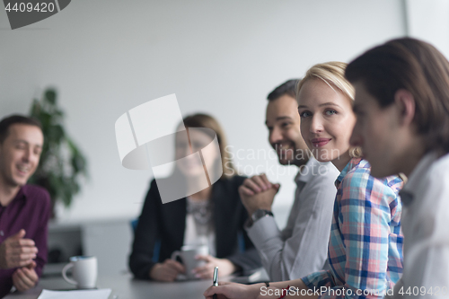 Image of Group of young people meeting in startup office