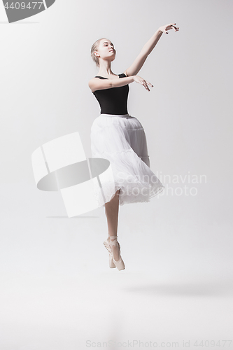 Image of Young classical dancer isolated on white background.