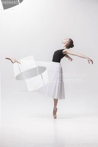 Image of Young classical dancer isolated on white background.