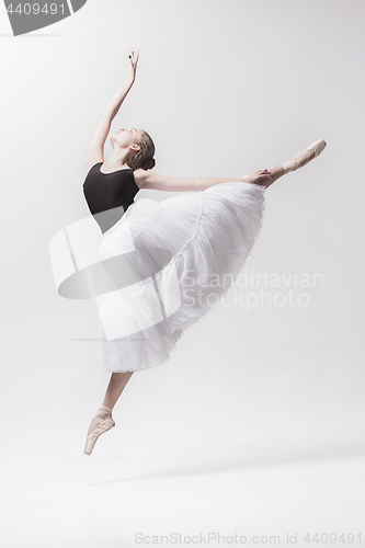 Image of Young classical dancer isolated on white background.