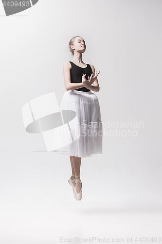 Image of Young classical dancer isolated on white background.