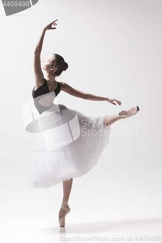 Image of Young classical dancer isolated on white background.