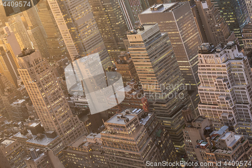 Image of New York City skyline with urban skyscrapers at sunset, USA.