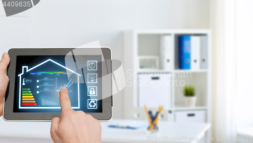 Image of tablet pc with smart home settings on screen