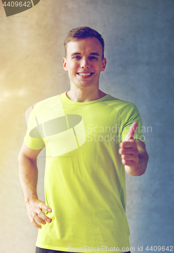 Image of smiling man in gym