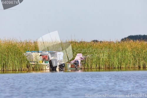 Image of Fishing boats on a lake