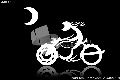 Image of Motorcycle rider racing with the moon