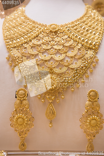 Image of gold jewelry in the shop window