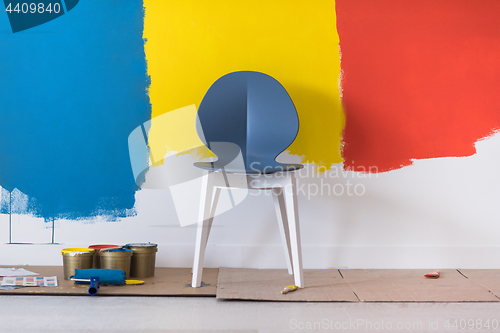 Image of empty chair and equipment for painting