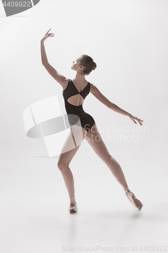 Image of Young classical dancer isolated on white background.