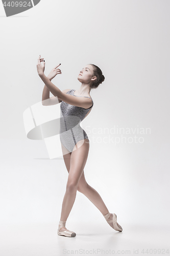 Image of Young classical dancer isolated on white background.