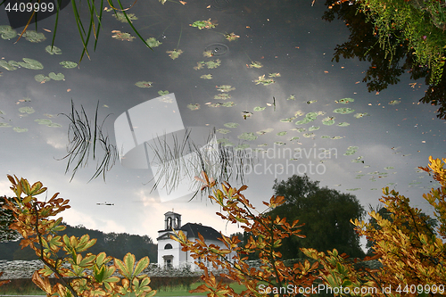 Image of Church reflection Hørsholm Slotshave in autumn