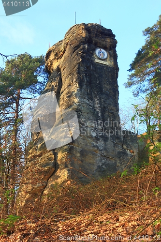 Image of Rock with medallion