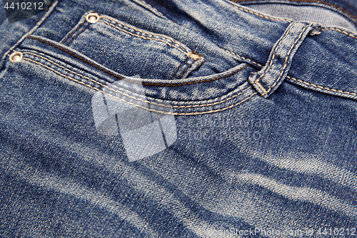 Image of Dark blue jeans close-up background