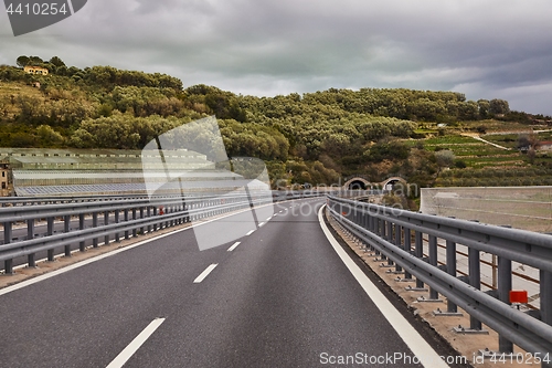 Image of Highway with approaching tunnel