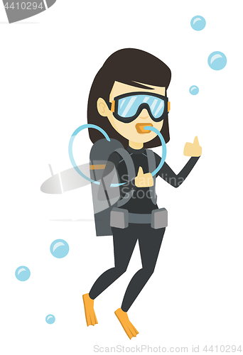 Image of Woman diving with scuba and showing ok sign.