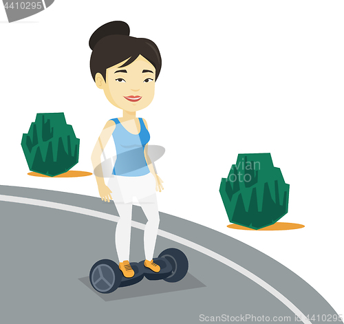 Image of Woman riding on self-balancing electric scooter.