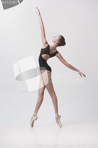 Image of Young classical dancer isolated on white background.