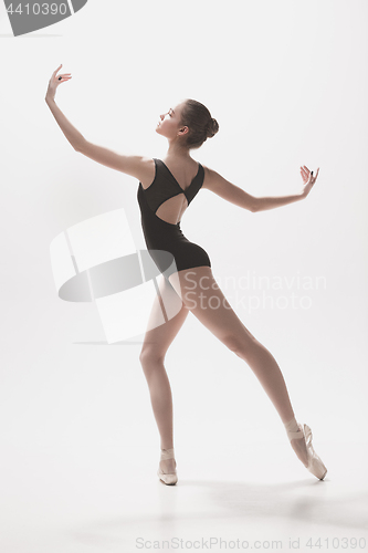 Image of Young classical dancer isolated on white background.