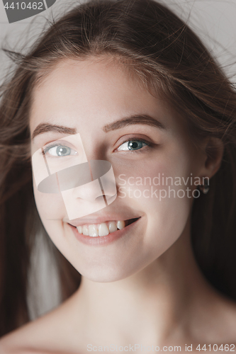 Image of face of a beautiful young girl with a clean fresh face close up