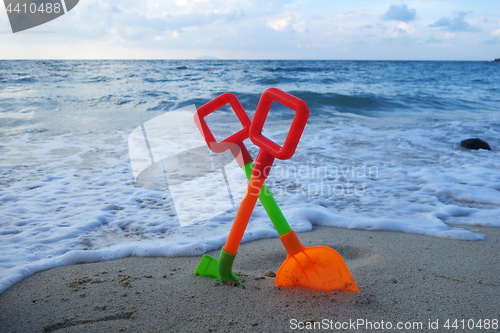 Image of Toys on the beach sand 