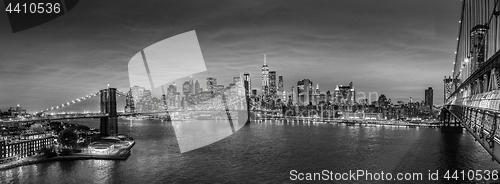 Image of Brooklyn Bridge and Lower Manhattan skyline at night, New York city, USA.