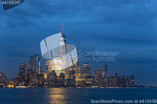 Image of Panoramic view of Lower Manhattan from Ellis Island at dusk, New York City.