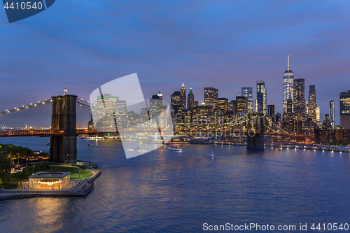 Image of Brooklyn Bridge and Lower Manhattan skyline at night, New York city, USA.