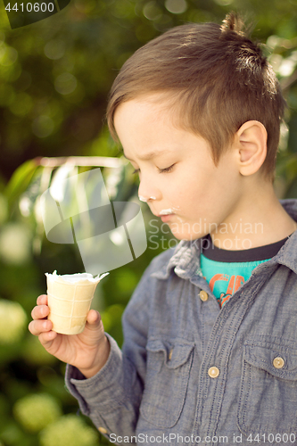 Image of Boy eating ice cream