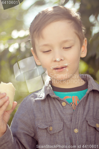 Image of Boy eating ice cream