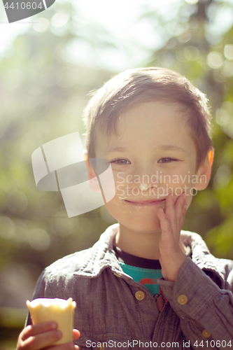 Image of Boy eating ice cream