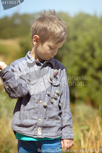 Image of Happy child playing outdoors