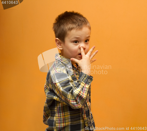 Image of Little boy picking his nose