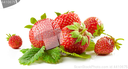 Image of fresh red strawberries with green leaves