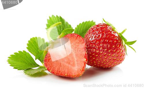 Image of fresh red strawberries with green leaves