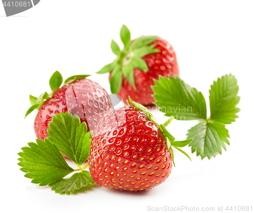 Image of fresh red strawberries with green leaves