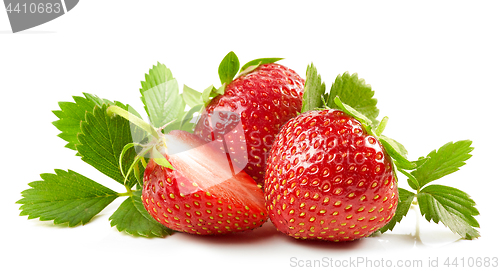 Image of fresh red strawberries with green leaves